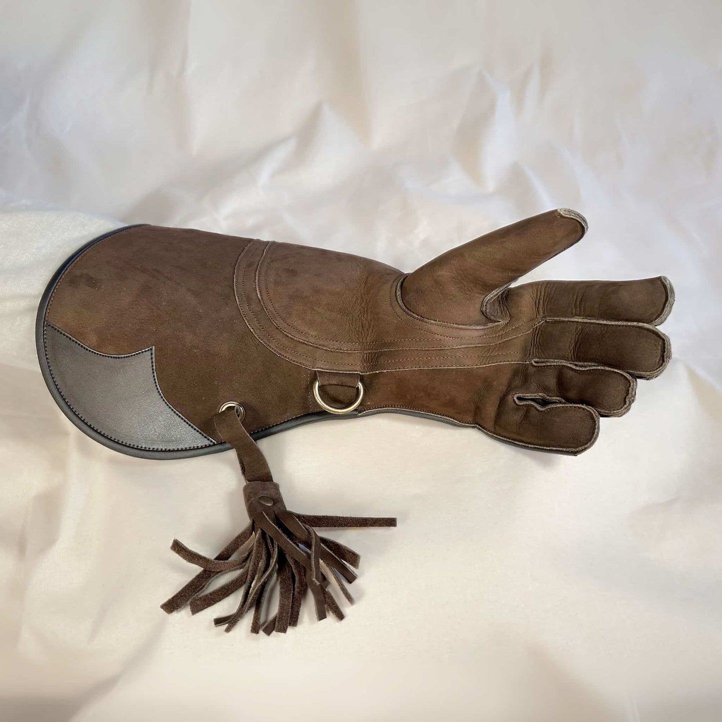 An Eagle Full-Cuff long falcon gauntlet made with Calf Leather looking at the palm.
