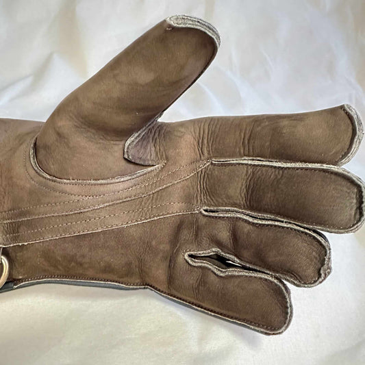 An Eagle Full-Cuff long falcon gauntlet made with Calf Leather looking at the palm up close.