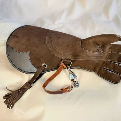 An Eagle Full-Cuff long falcon gauntlet made with Calf Leather looking at the palm with the (not included but available for purchase) French snap and leather thong. 