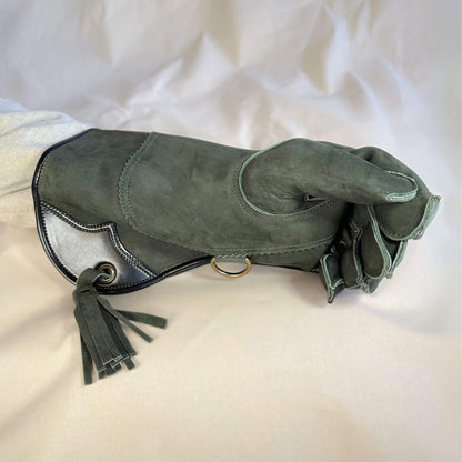 A Forest Green Full-Cuff long falcon gauntlet made with Calf Leather looking at the closed fist.