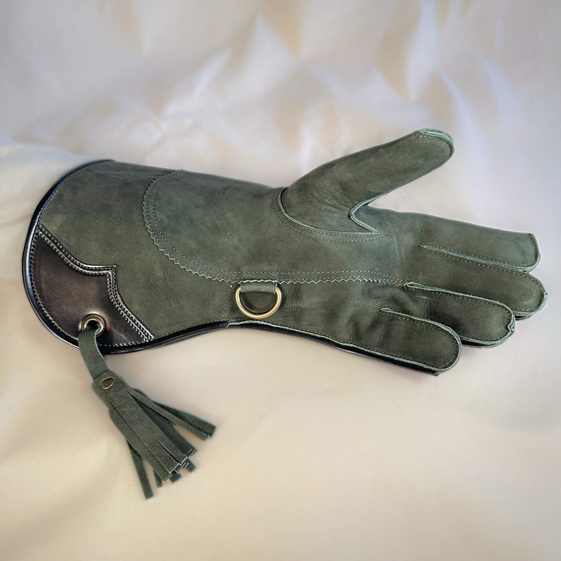 A Forest Green Full-Cuff long falcon gauntlet made with Calf Leather looking at the palm side.