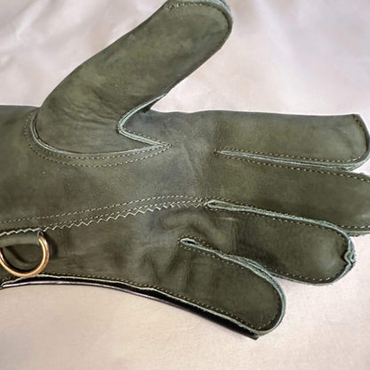 A Forest Green Full-Cuff long falcon gauntlet made with Calf Leather looking at the palm up close.
