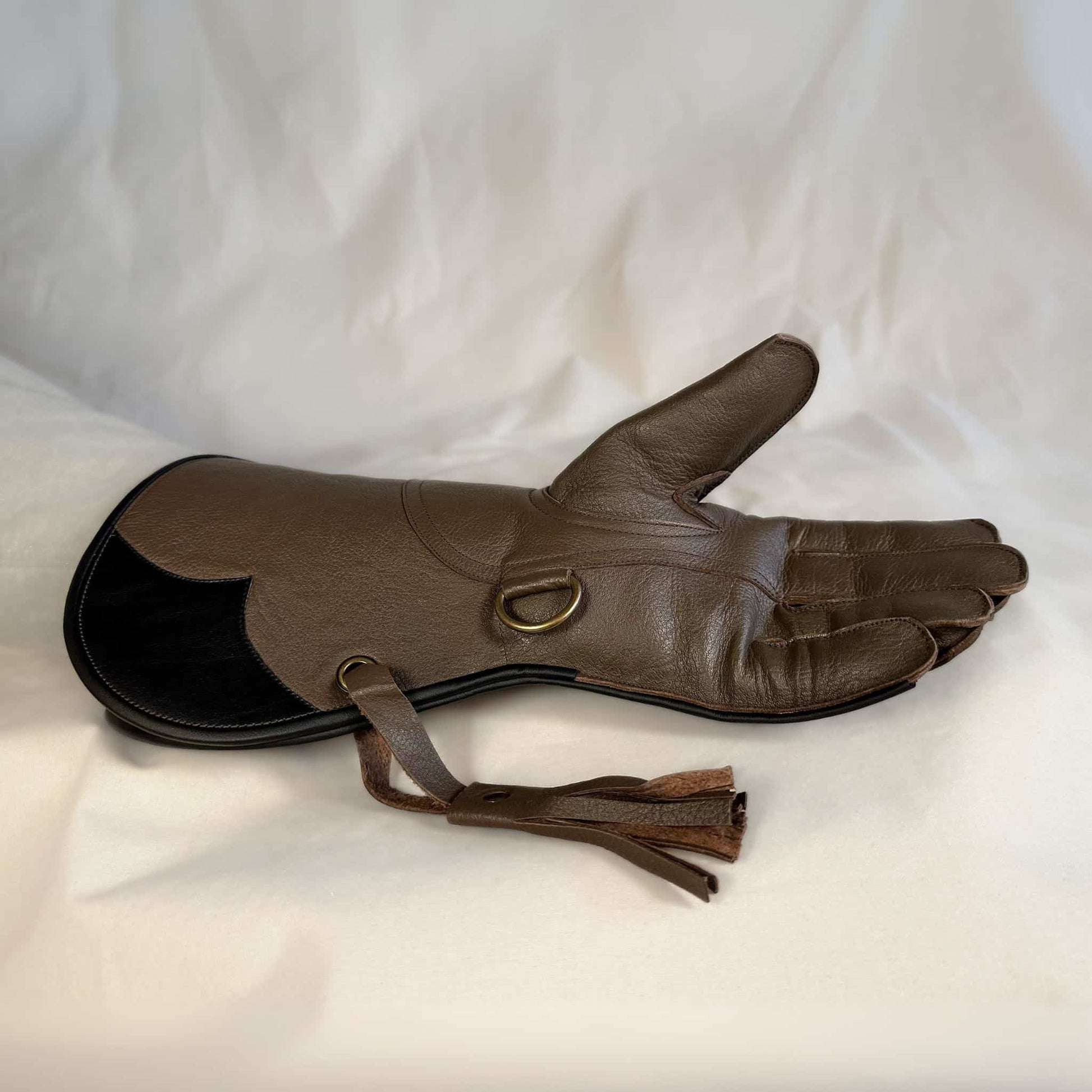 A long Full-Cuff brown falcon gauntlet made with Kangaroo Leather looking at the palm side.