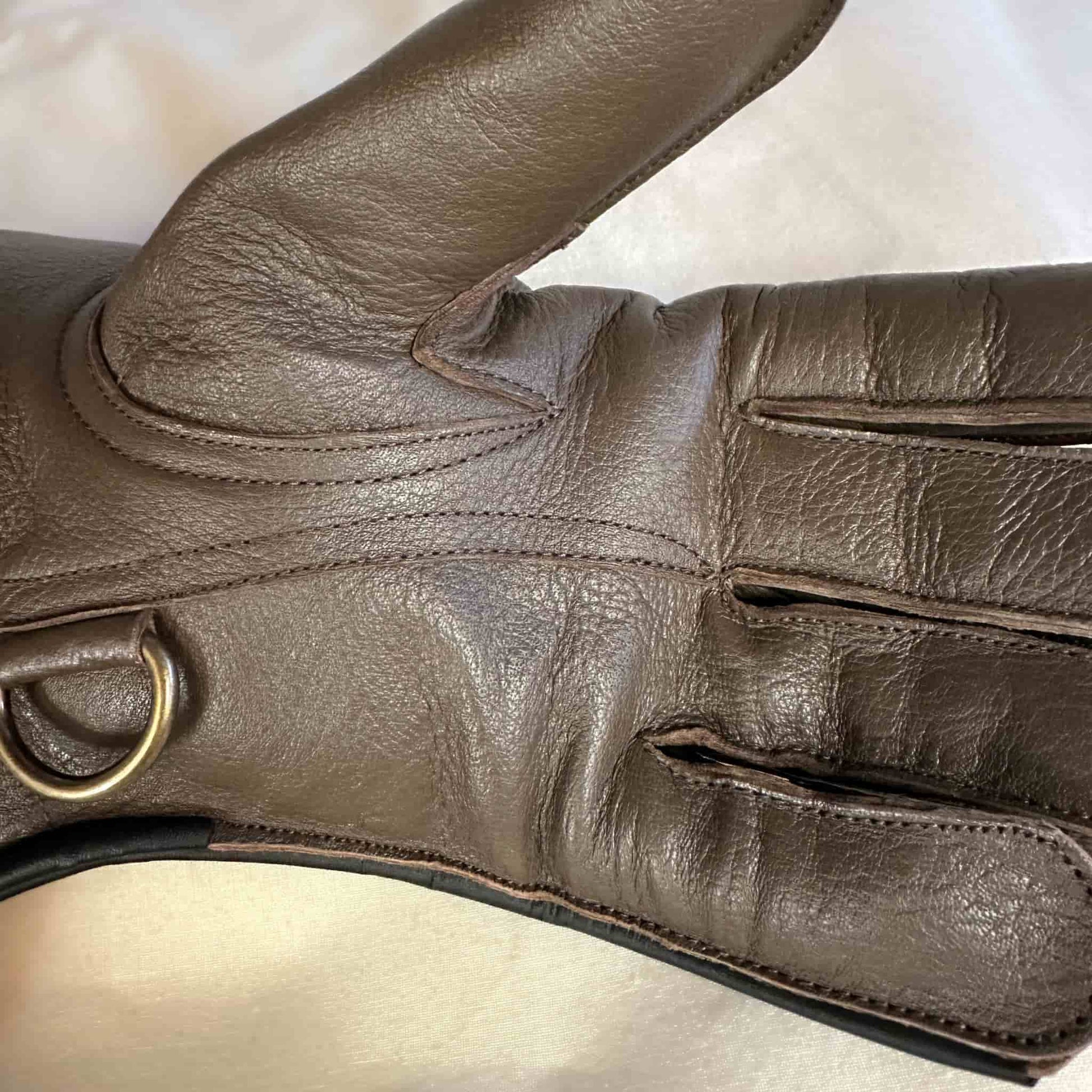A long Full-Cuff brown falcon gauntlet made with Kangaroo Leather looking at the palm up close.