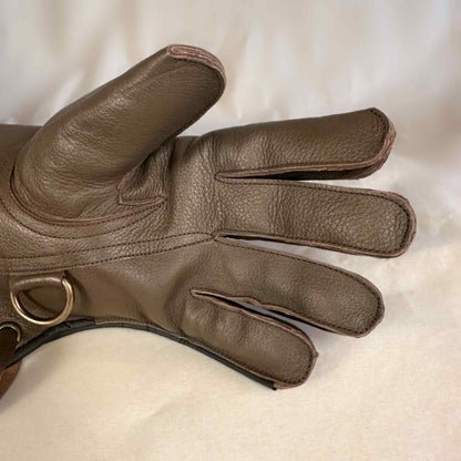 A long Half-Cuff brown falcon gauntlet made with Kangaroo Leather looking at the palm up close.